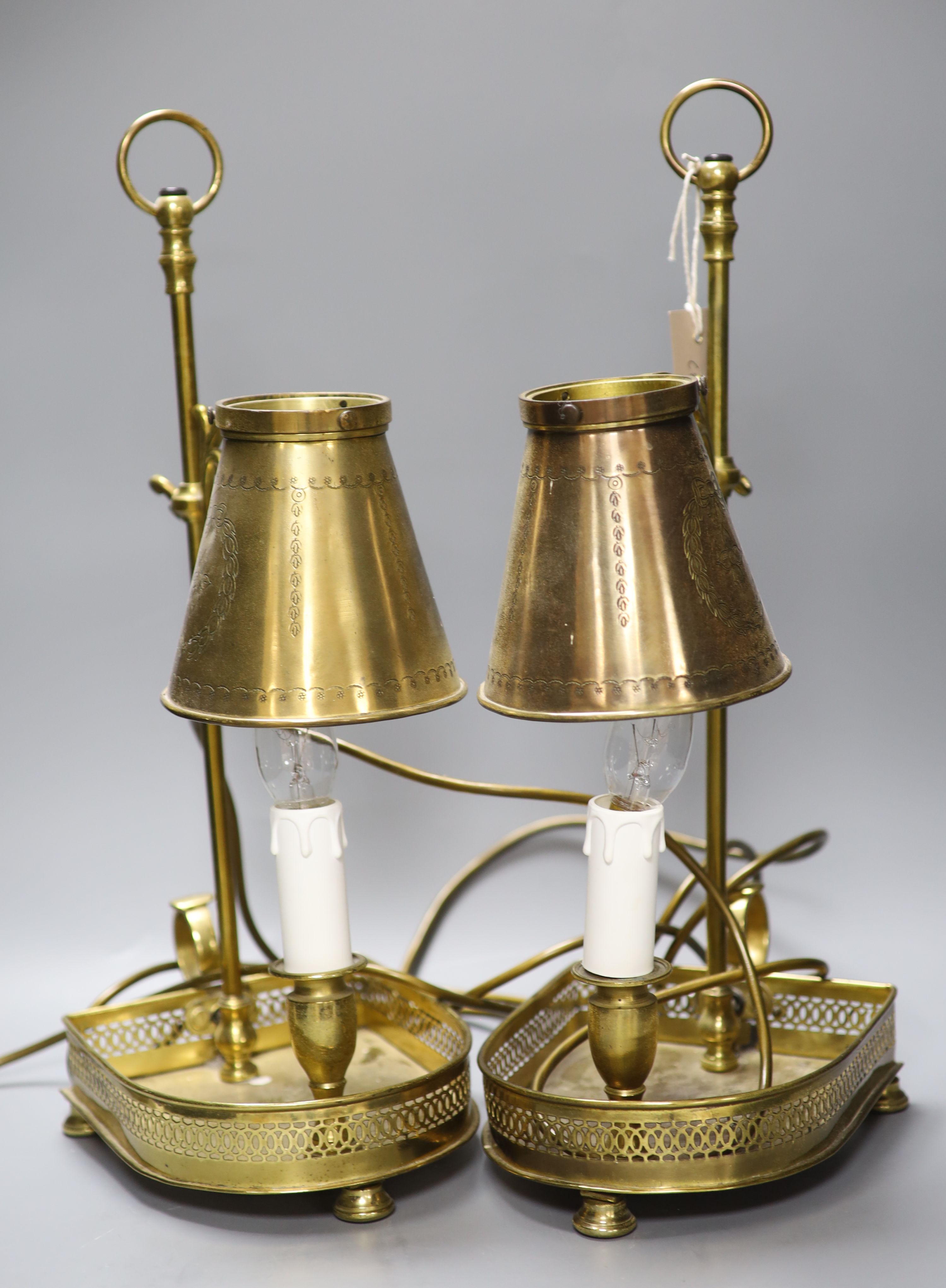 A pair of gilt metal Bouillotte lamps, with adjustable shades, height 47cm